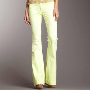 Stitch’s neon yellow flared jeans